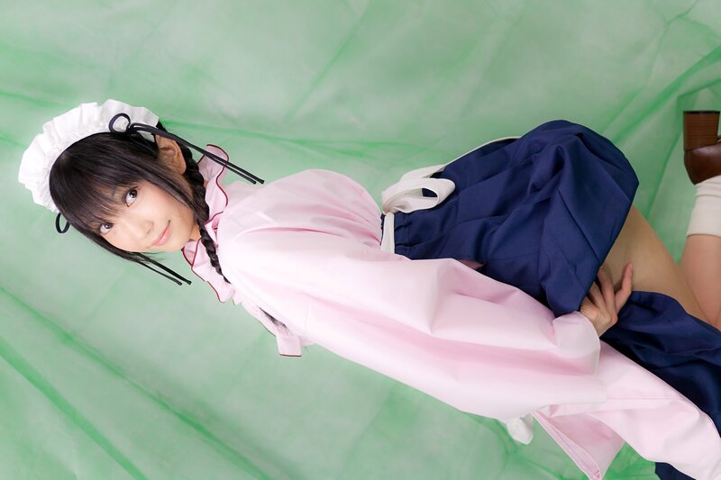 cosplayer in pink and blue outfit