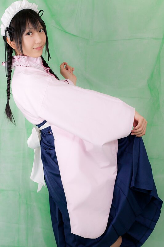 cosplayer in pink and blue outfit
