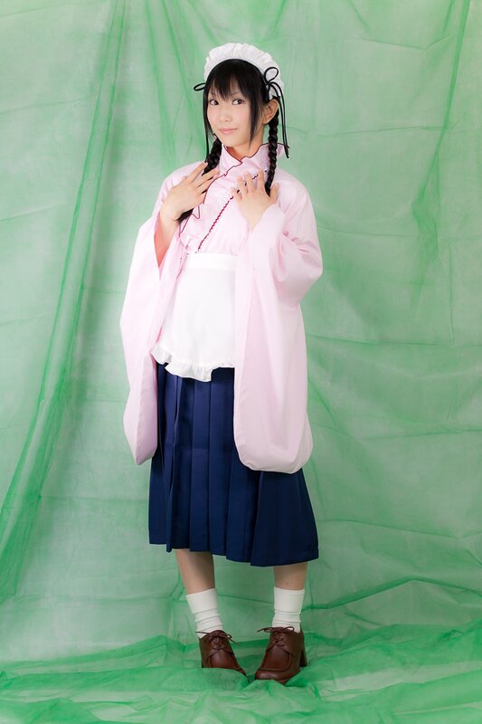 cosplayer in pink and blue outfit