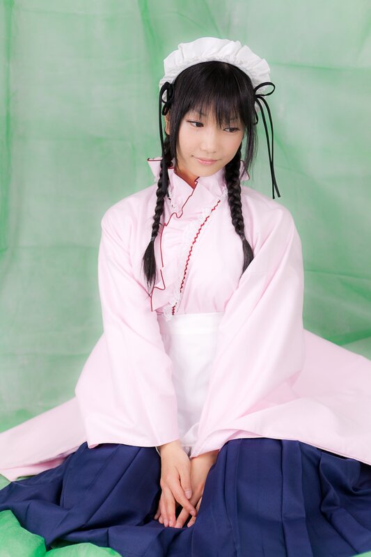cosplayer in pink and blue outfit