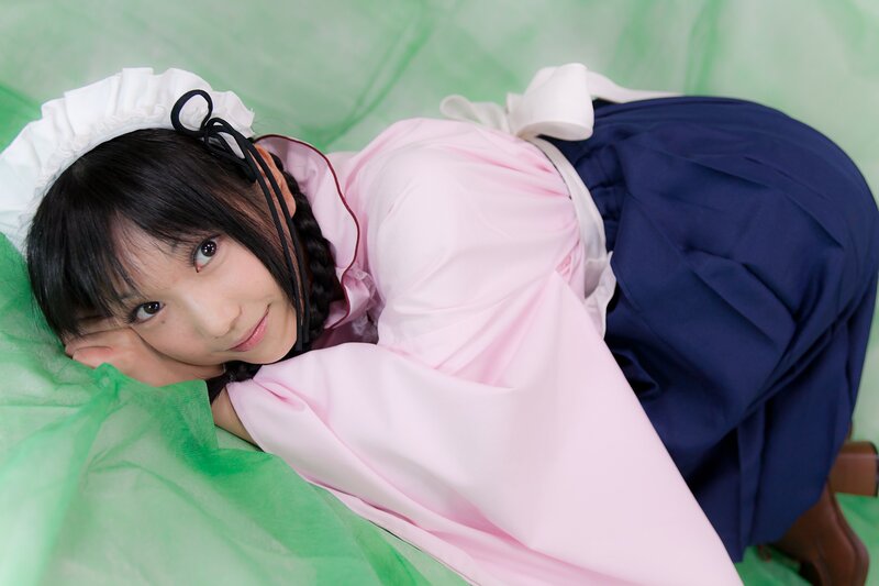 cosplayer in pink and blue outfit