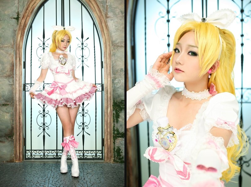 cosplayer in pink and white dress