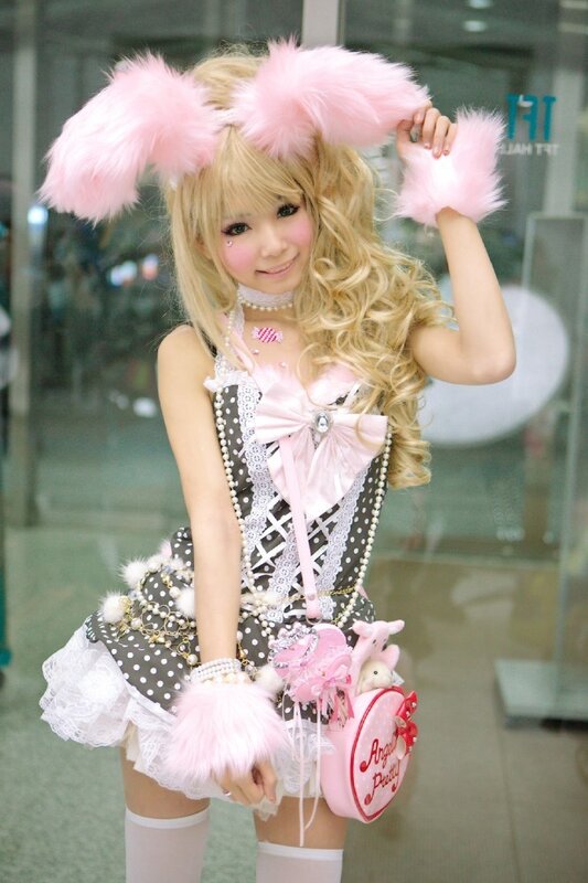 cosplayer in pink bunny costume