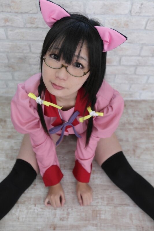 cosplayer in pink cat ears