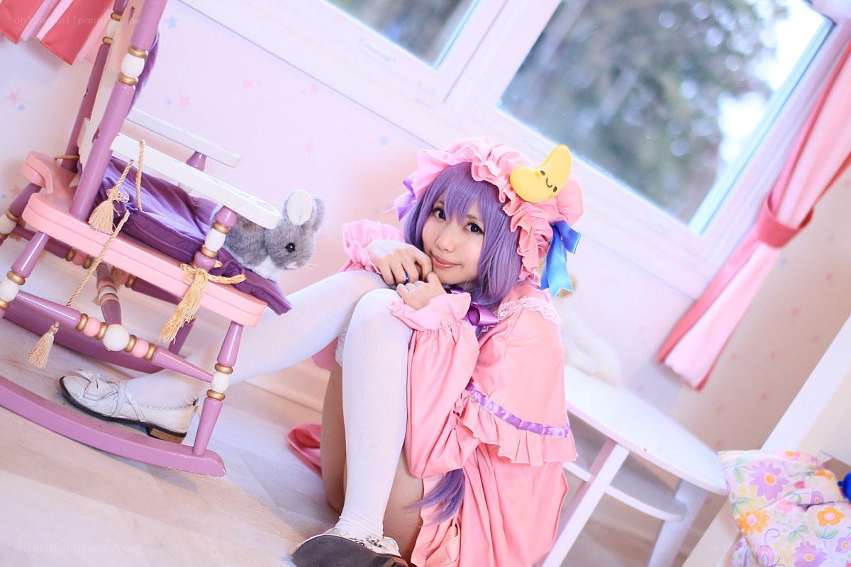 cosplayer in pink dress