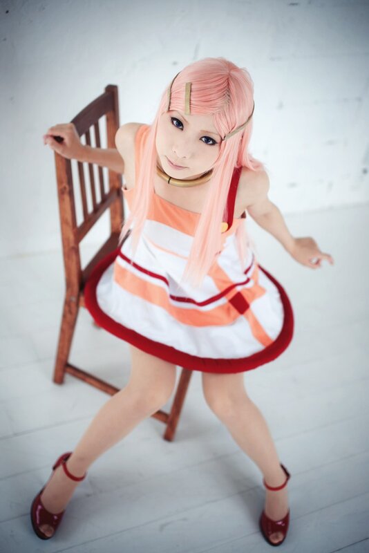 cosplayer in pink wig and dress