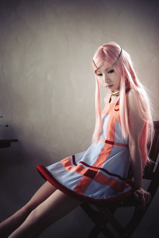 cosplayer in pink wig and dress