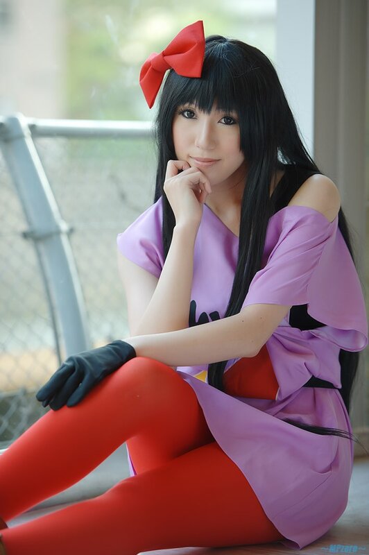 cosplayer in purple and red outfit