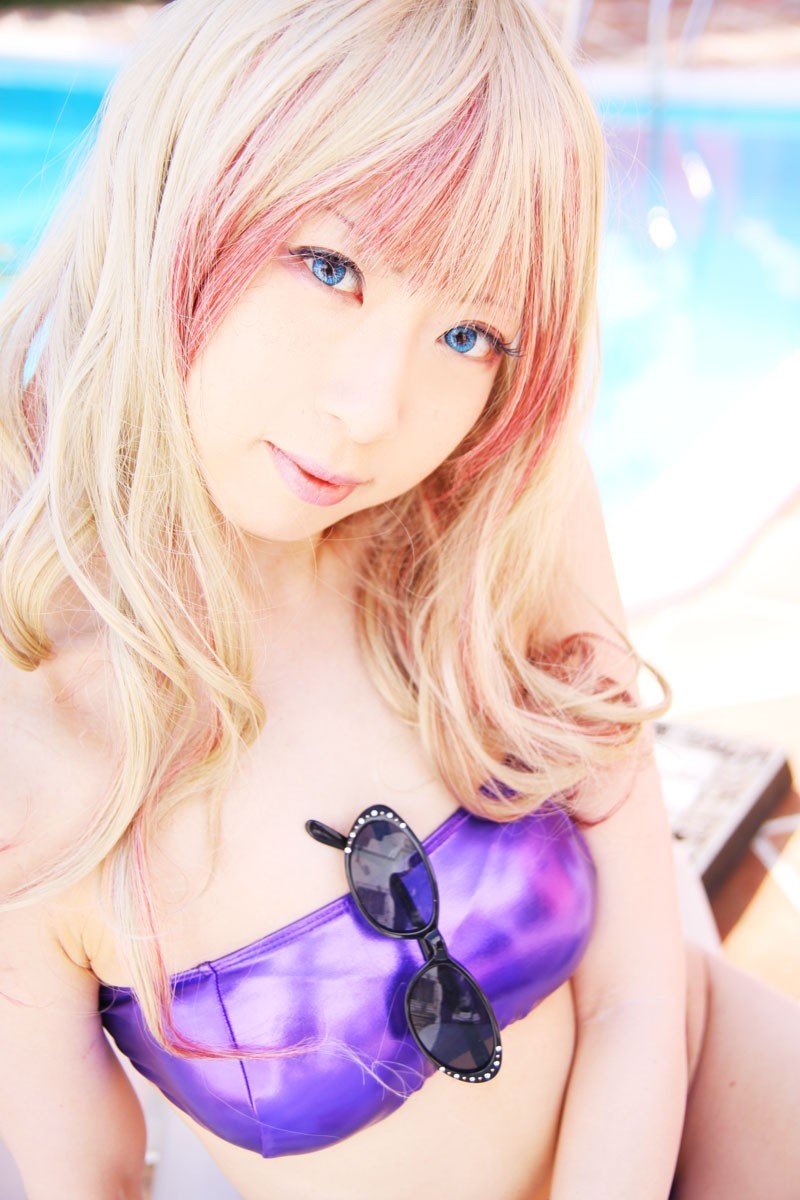 cosplayer in purple bikini