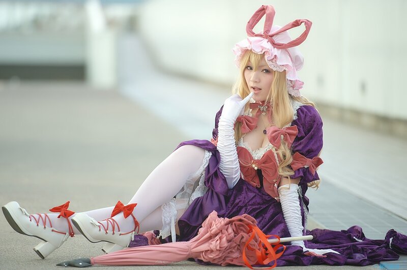 cosplayer in purple dress