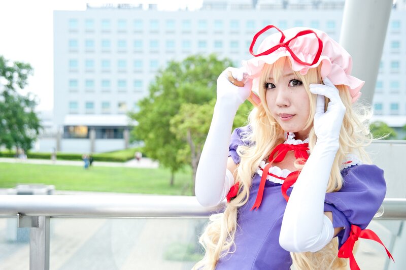 cosplayer in purple dress