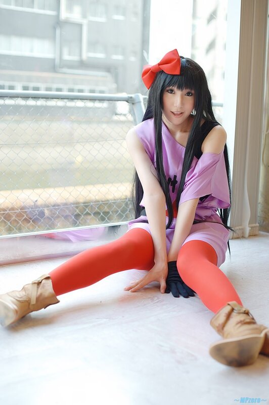cosplayer in purple outfit