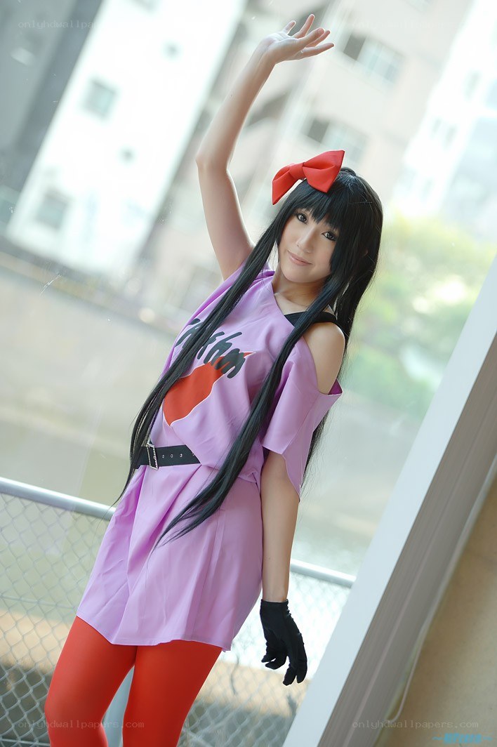 cosplayer in purple outfit
