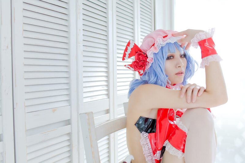 cosplayer in red and blue costume