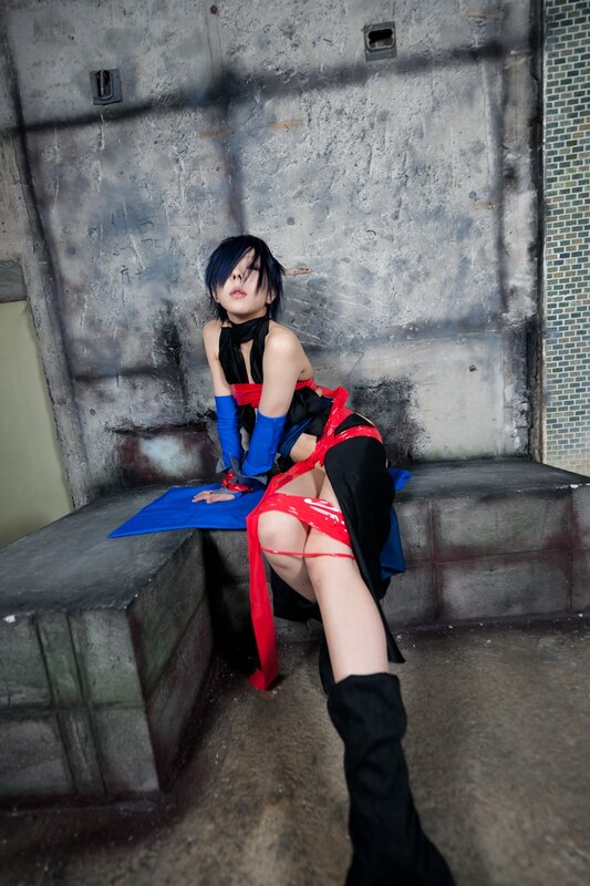 cosplayer in red and blue costume