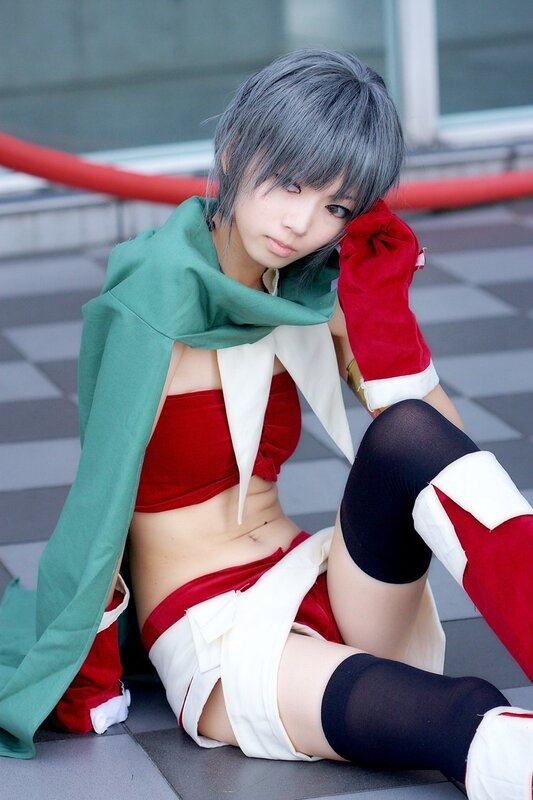 cosplayer in red and green costume