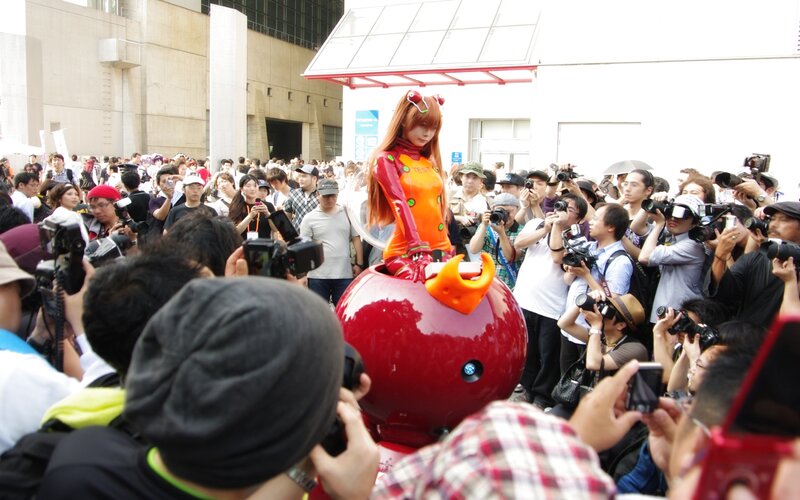 cosplayer in red and orange suit
