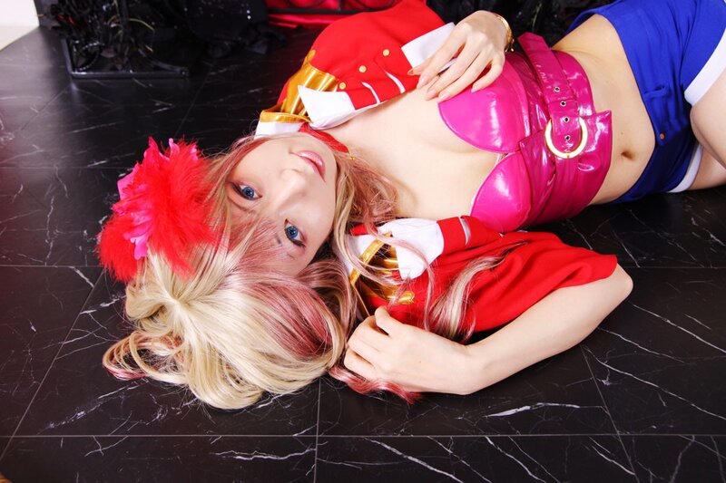cosplayer in red and pink costume