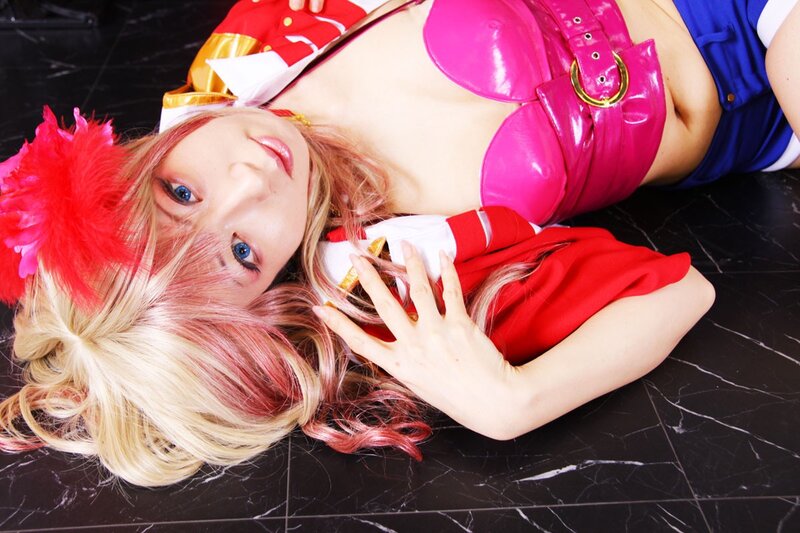 cosplayer in red and pink costume