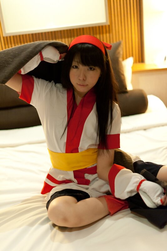 cosplayer in red and white costume