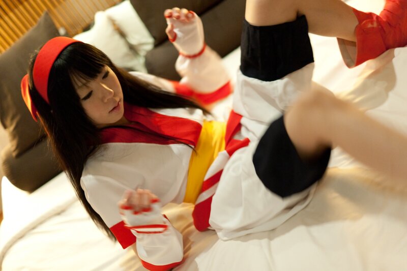 cosplayer in red and white costume