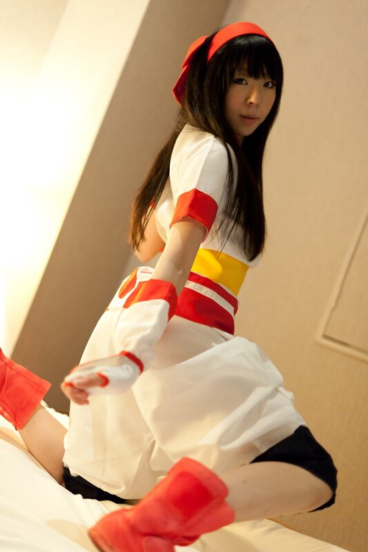 cosplayer in red and white costume
