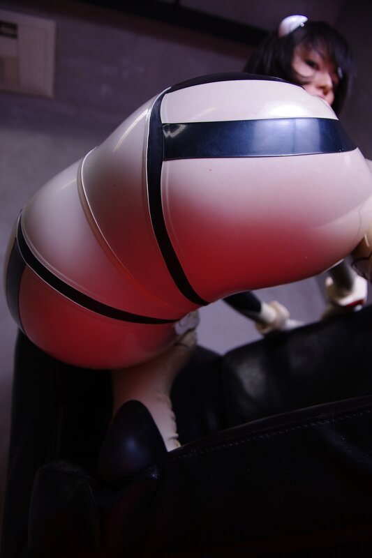 cosplayer in red and white costume
