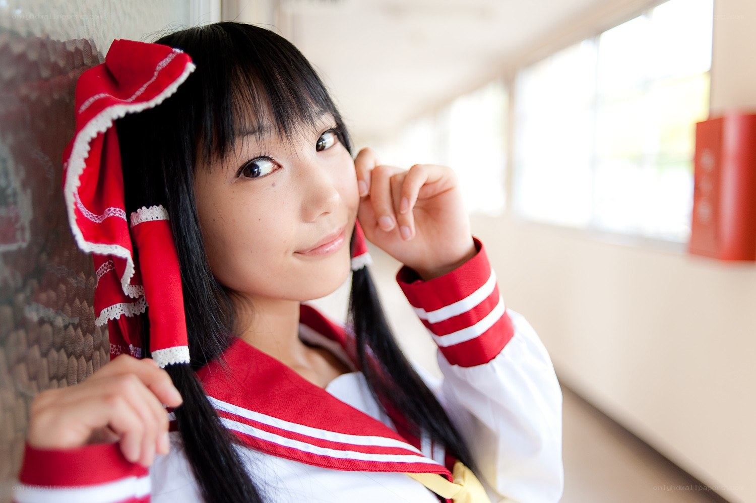 cosplayer in red and white uniform