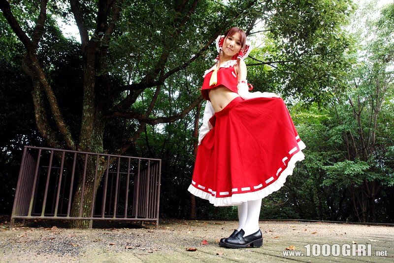 Cosplayer in red dress outdoors