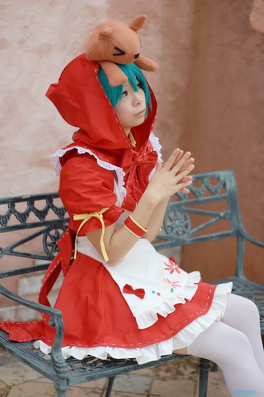 cosplayer in red hooded dress