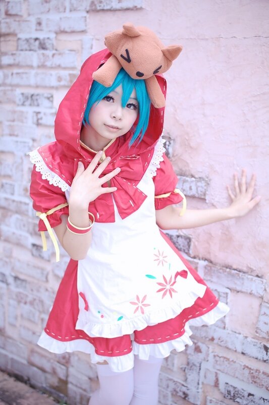 cosplayer in red hooded dress
