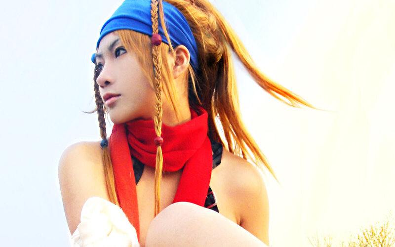cosplayer in red scarf and blue headband