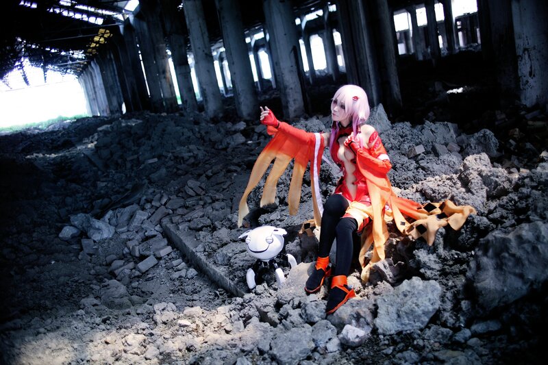 cosplayer in ruined structure