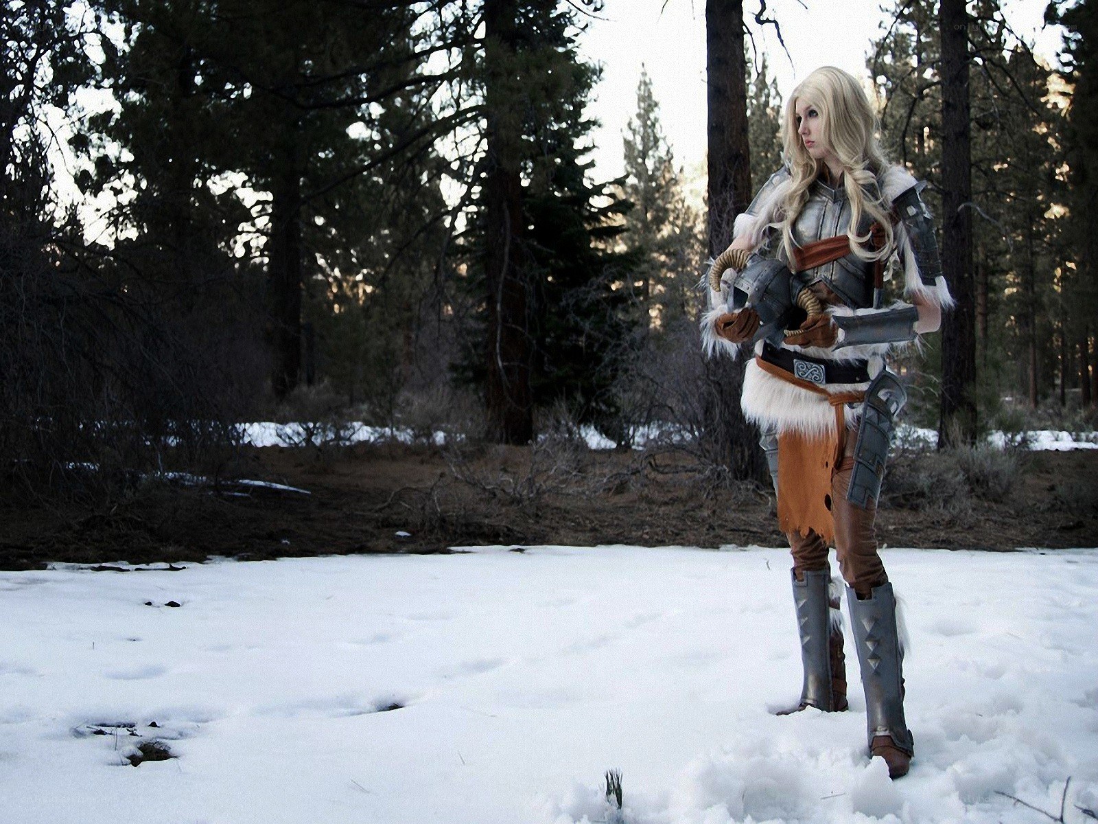 cosplayer in snowy forest