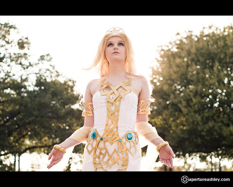 Cosplayer in White and Gold