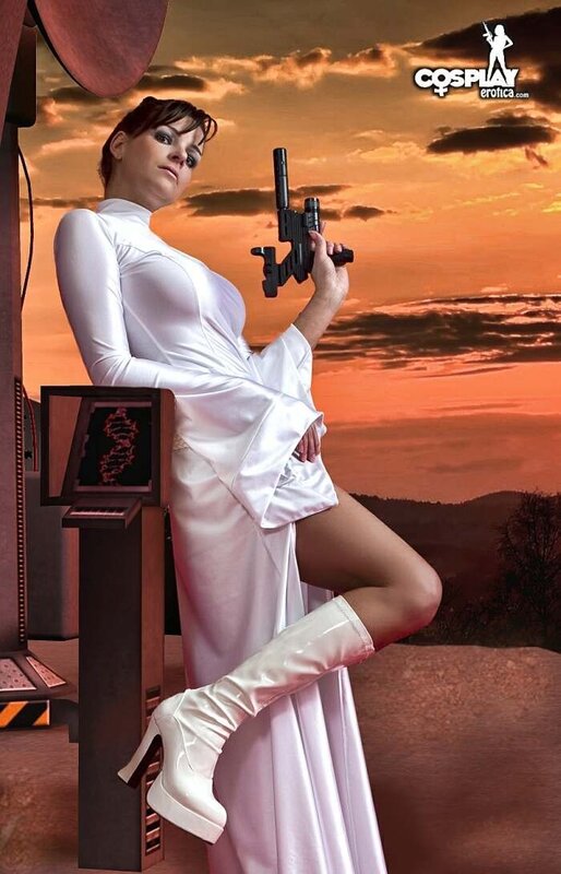 cosplayer in white dress holding gun