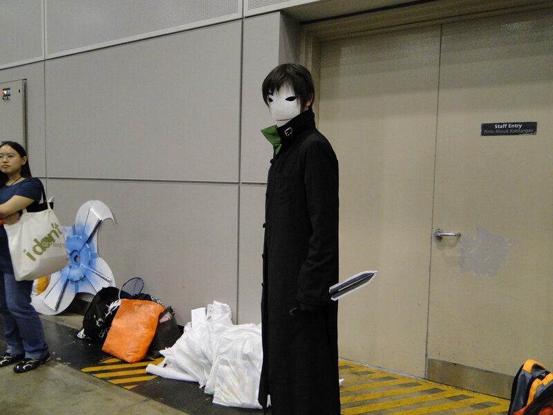 cosplayer in white mask