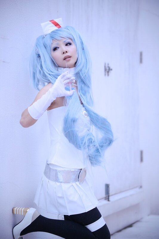 cosplayer in white nurse outfit