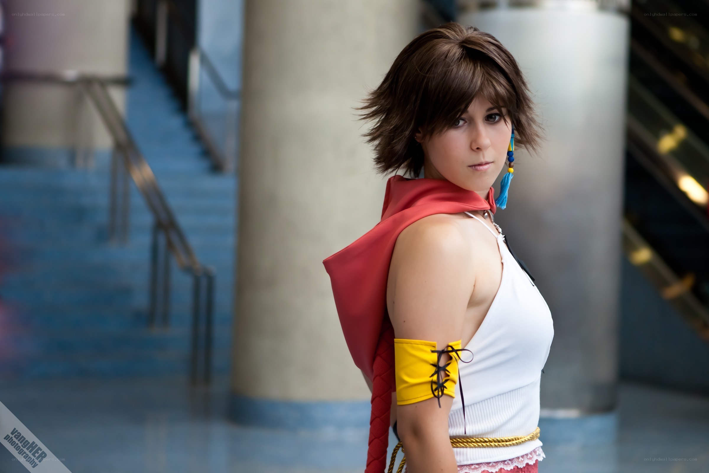 cosplayer in white top and red cape