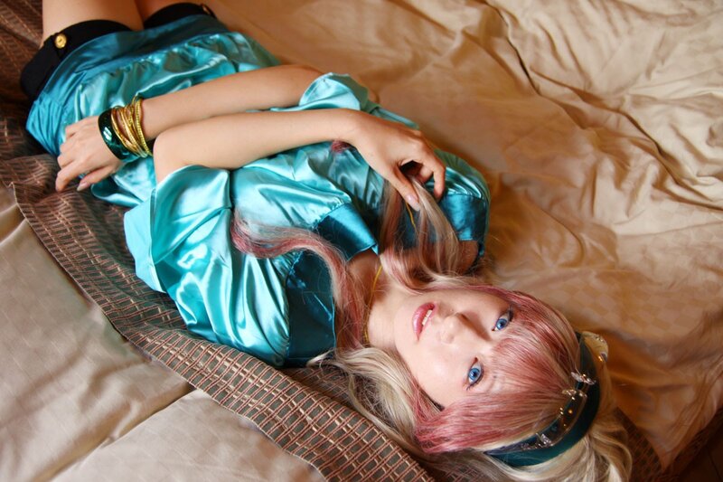 cosplayer lying on bed