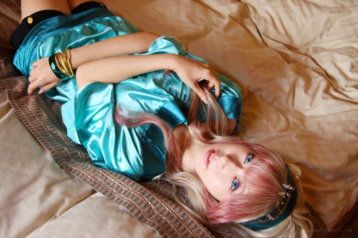 cosplayer lying on bed