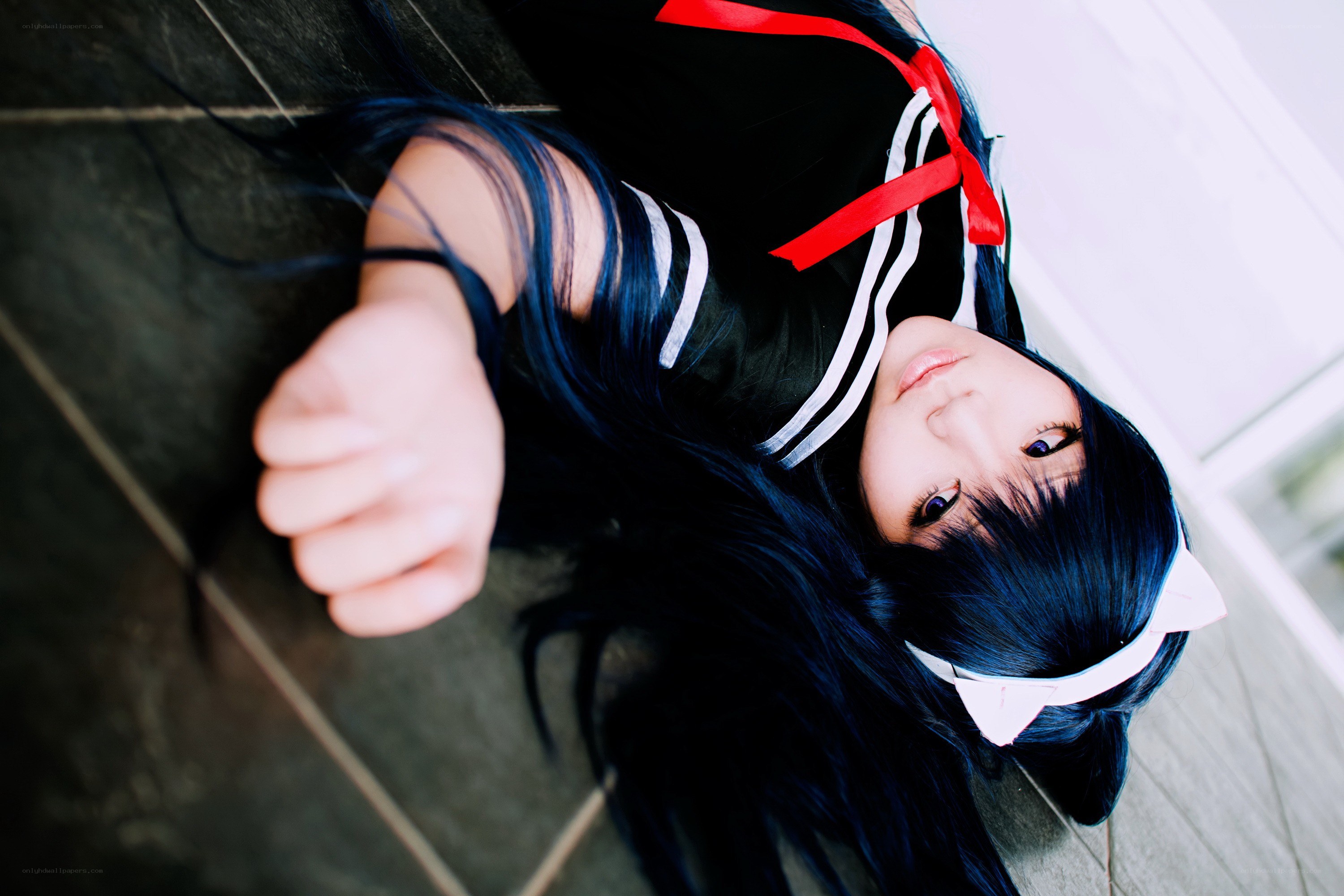 cosplayer lying on floor