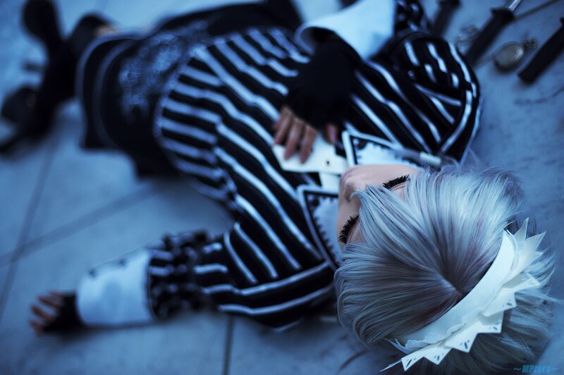 cosplayer lying on ground