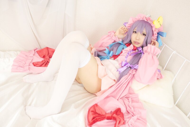 Cosplayer on a Bed — Pink