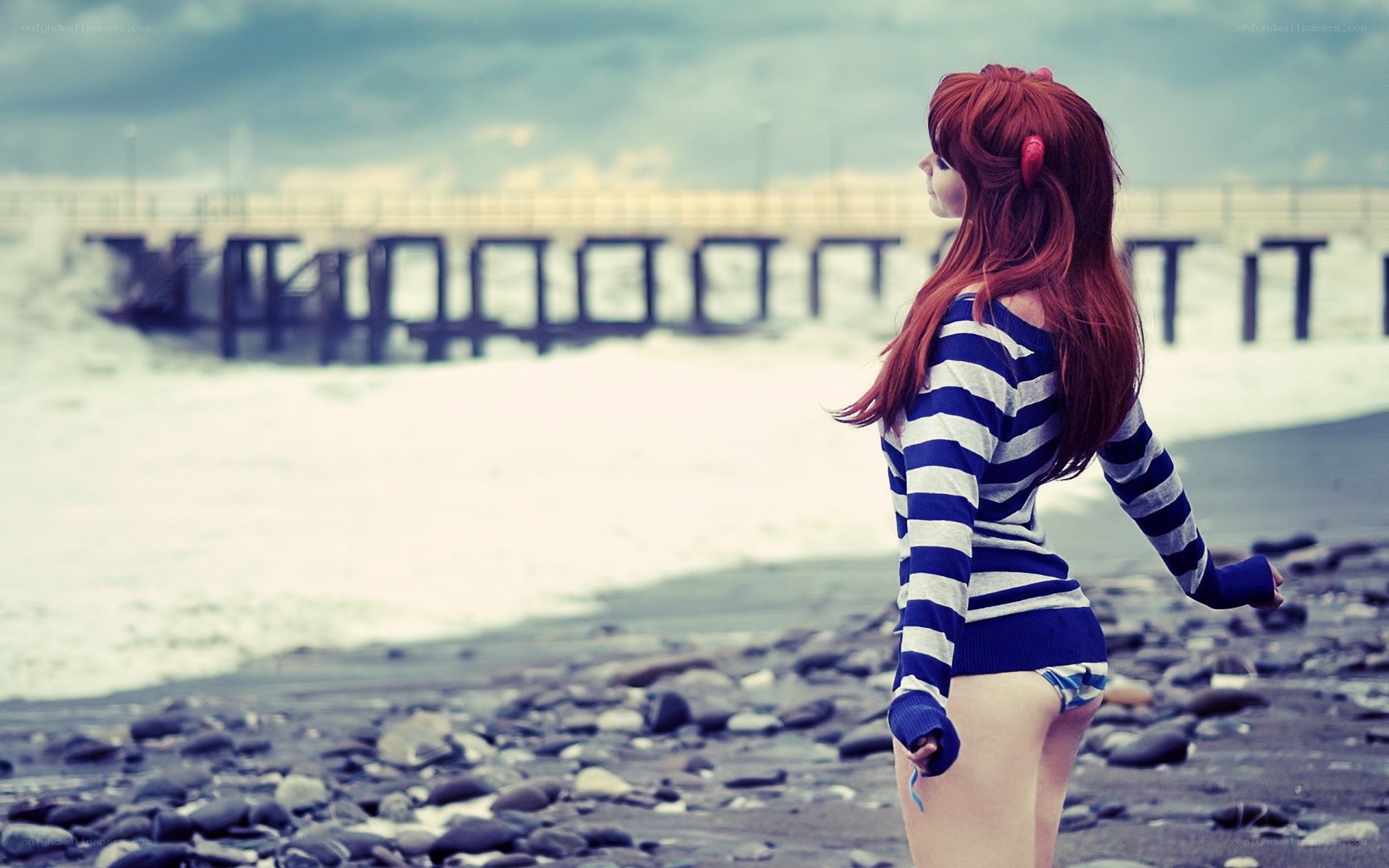 cosplayer on a rocky beach