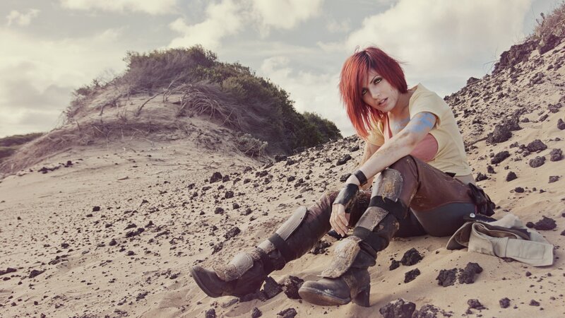 cosplayer on a rocky beach