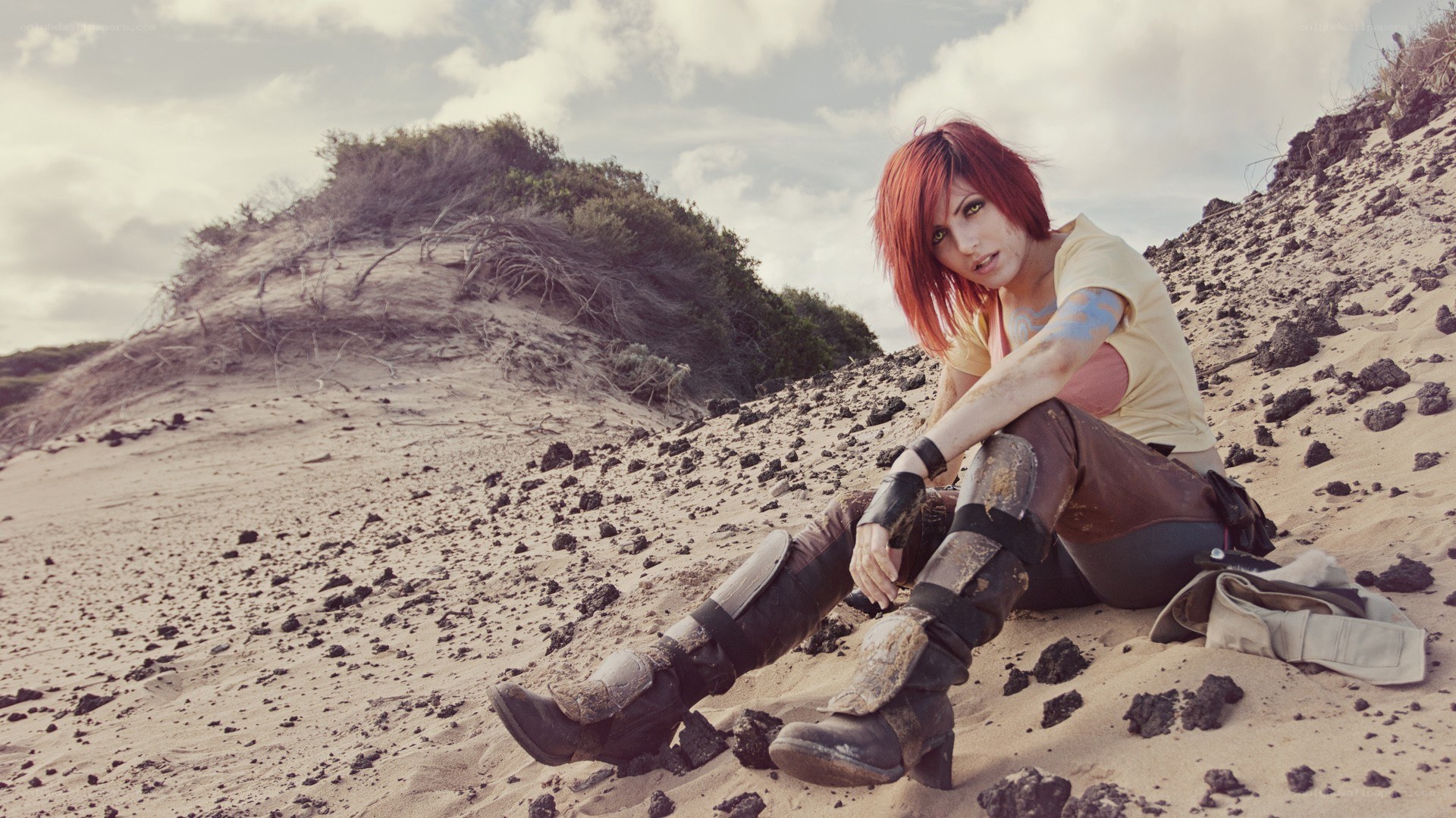cosplayer on a rocky beach