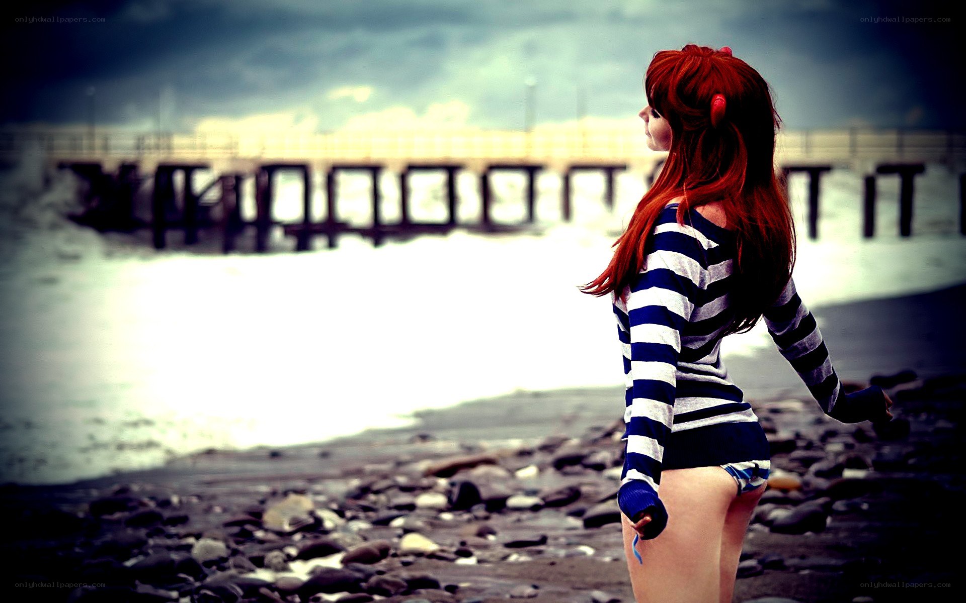 cosplayer on a rocky beach