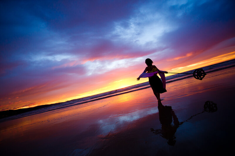Cosplayer on beach at sunset
