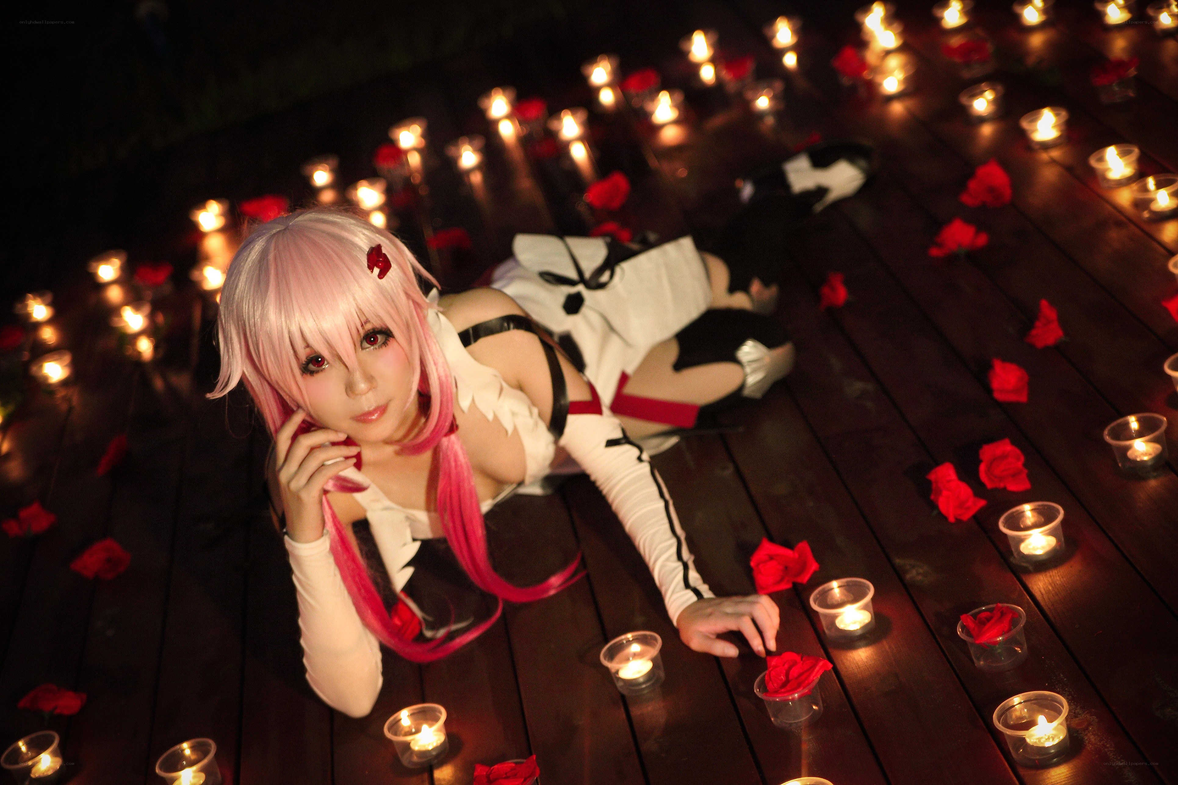 cosplayer on candlelit deck